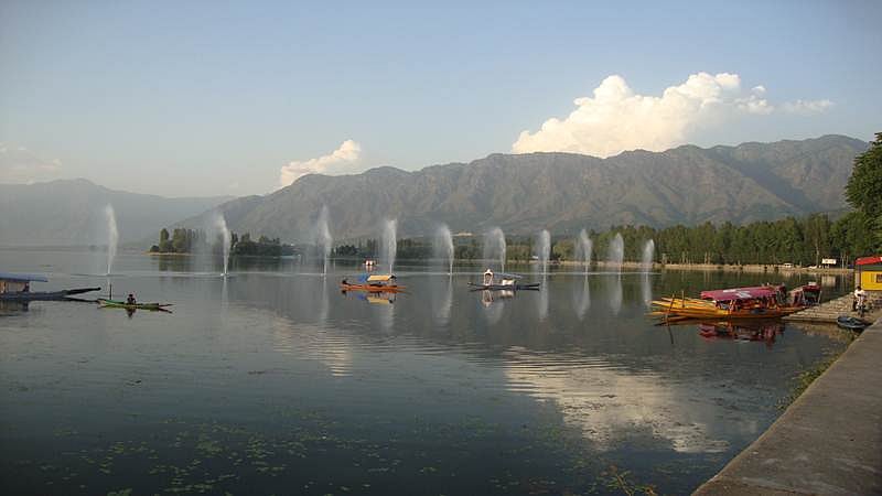 Cleaning of Dal Lake in full swing despite unrest in Kashmir