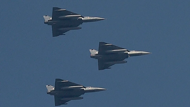 New Delhi: Indian Air Force’s Tejas planes flying past for the first time during a full dress rehearsal for the Republic Day Parade at Rajpath in New Delhi on Monday. PTI Photo by Kamal Singh