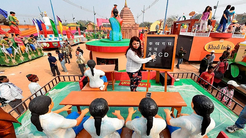 New Delhi: Haryana tableaux artists, participating in the forthcoming Republic Day function, during a press preview in New Delhi on Sunday. PTI Photo by Kamal Singh