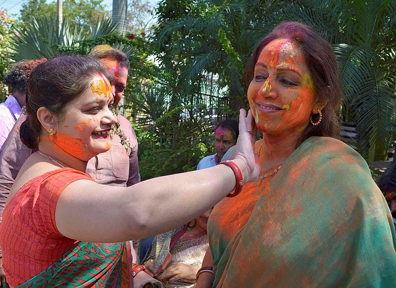 BJP MP and Bollywood actress Hemamalini celebrating Holi festival in Mathura on Monday.