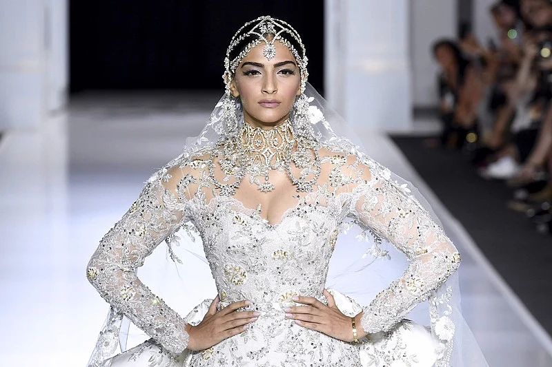 Paris Fashion Week 2017 Pictures: Fashionista Sonam Kapoor stuns in bridal white gown