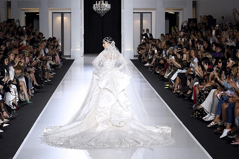 Paris Fashion Week 2017 Pictures: Fashionista Sonam Kapoor stuns in bridal white gown