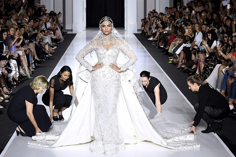 Paris Fashion Week 2017 Pictures: Fashionista Sonam Kapoor stuns in bridal white gown