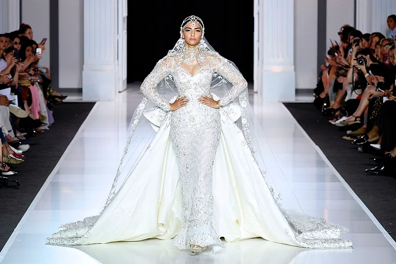 Paris Fashion Week 2017 Pictures: Fashionista Sonam Kapoor stuns in bridal white gown