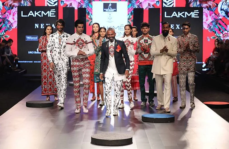 Designer Ajay Kumar with models at the Johnnie Walker presents Mr.Ajay Kumar