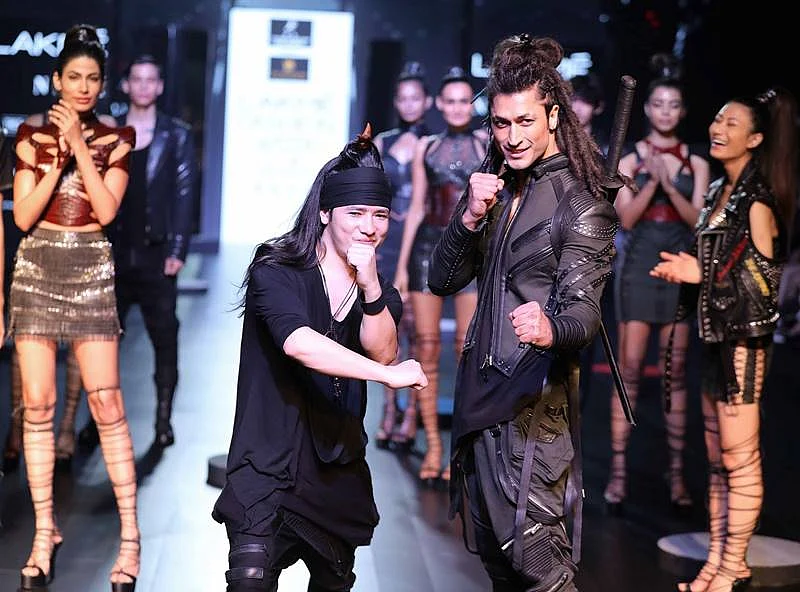 Designer Asa Kazingmei with showstopper Vidyut Jamwal at the Johnnie Walker presents Asa Kazingmei