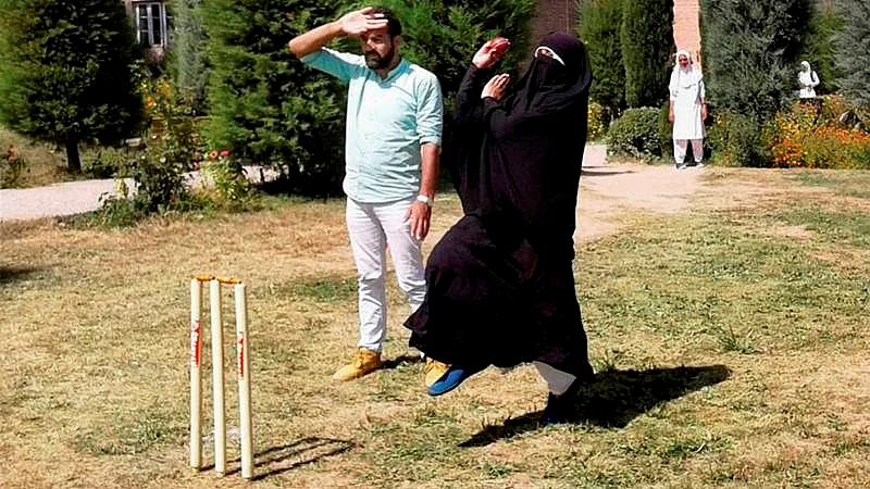 Cricket in burqa. A woman cricketer in Baramulla defying social restrictions in her passion for the sport. PTI Photo (STOTRY DEL18)