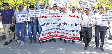 Indore: 200 industrialists take to streets to protest hike in charges