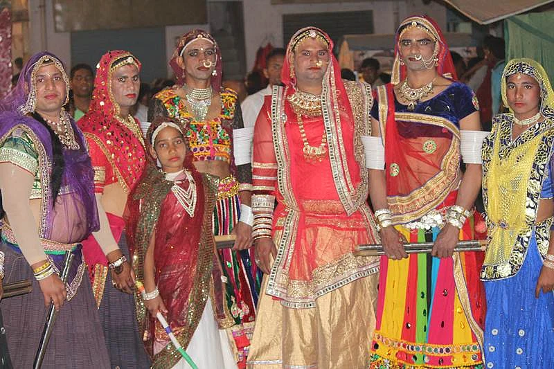 A group of men dressed in traditional finery for the Geendar dance