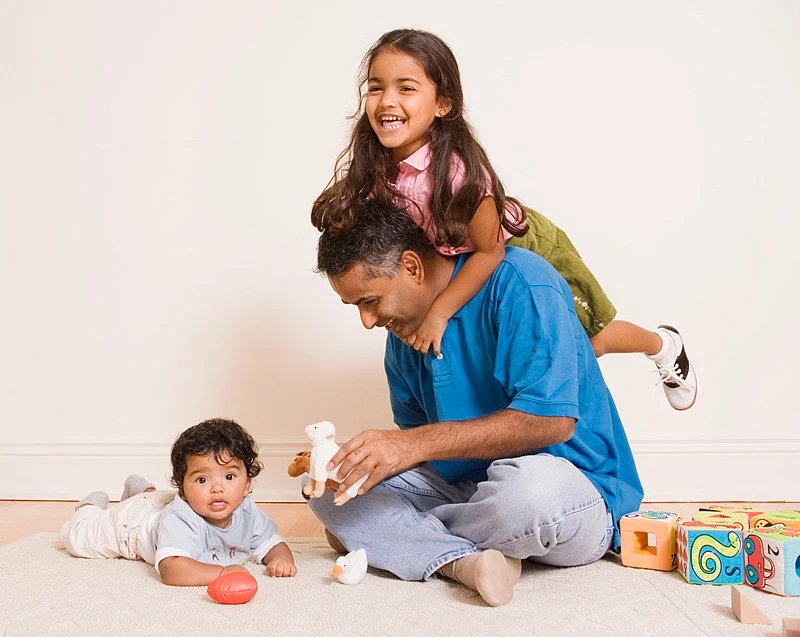 Father playing with children