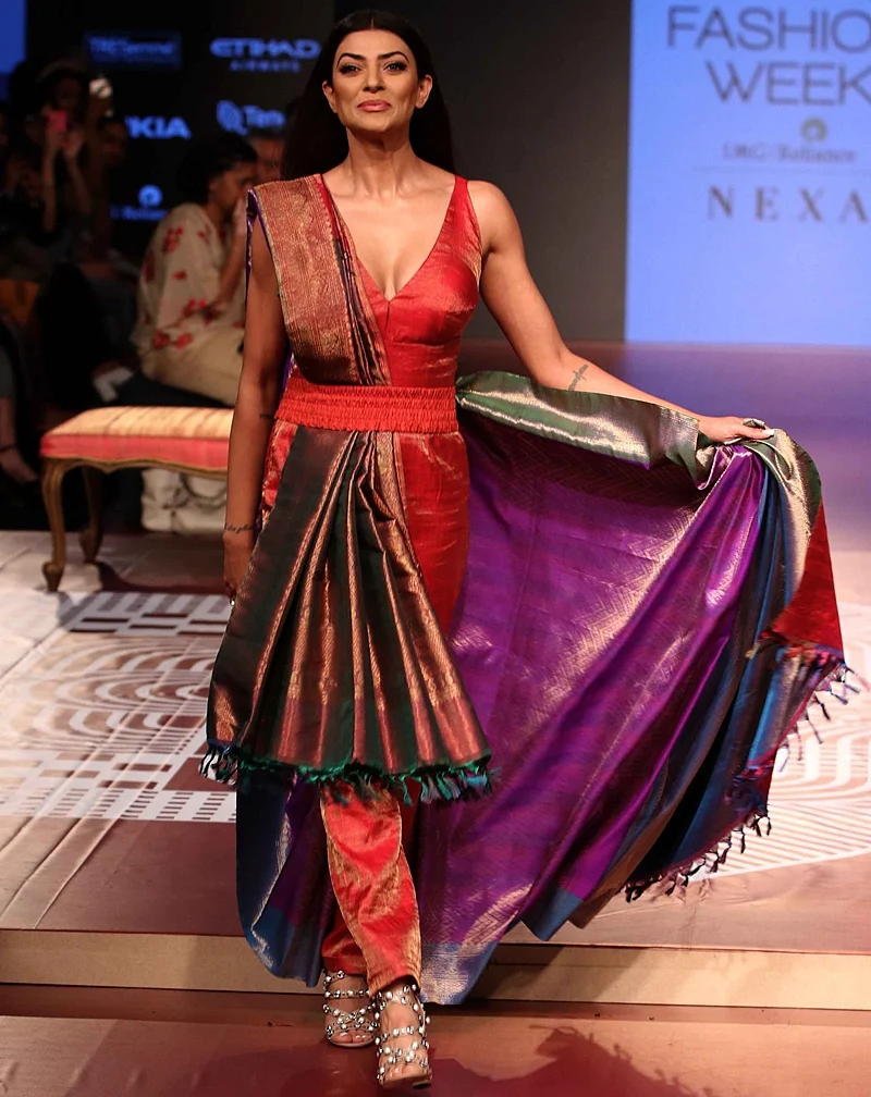 Mumbai: Bollywood actress Sushmita Sen walk ramp for RMKV Silks Re-Crafting traditional silks in collaboration with fashion designer Sunita Shankar during Lakme Fashion Week Winter/Festive 2018 in Mumbai on Thursday. Photo by BL SONI