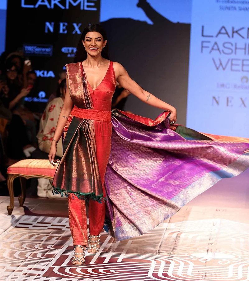 Mumbai: Bollywood actress Sushmita Sen walk ramp for RMKV Silks Re-Crafting traditional silks in collaboration with fashion designer Sunita Shankar during Lakme Fashion Week Winter/Festive 2018 in Mumbai on Thursday. Photo by BL SONI