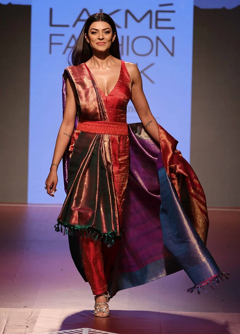 Mumbai: Bollywood actress Sushmita Sen walk ramp for RMKV Silks Re-Crafting traditional silks in collaboration with fashion designer Sunita Shankar during Lakme Fashion Week Winter/Festive 2018 in Mumbai on Thursday. Photo by BL SONI