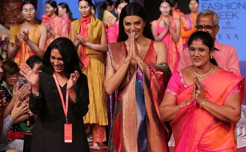 Mumbai: Bollywood actress Sushmita Sen walk ramp for RMKV Silks Re-Crafting traditional silks in collaboration with fashion designer Sunita Shankar during Lakme Fashion Week Winter/Festive 2018 in Mumbai on Thursday. Photo by BL SONI
