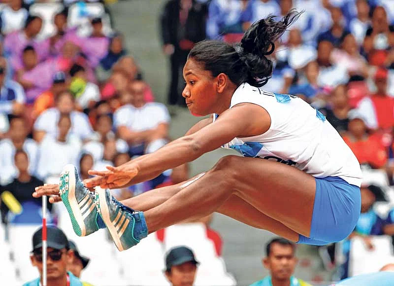 <strong>India’s Swapna Barman competes in the heptathlon long jump during the Asian Games on Wednesday</strong>