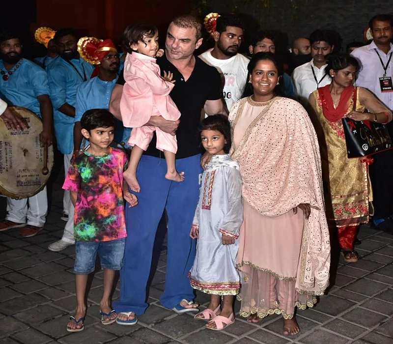 Sohail Khan, Ahil and Arpita Khan Sharma. Photo by Viral Bhayani