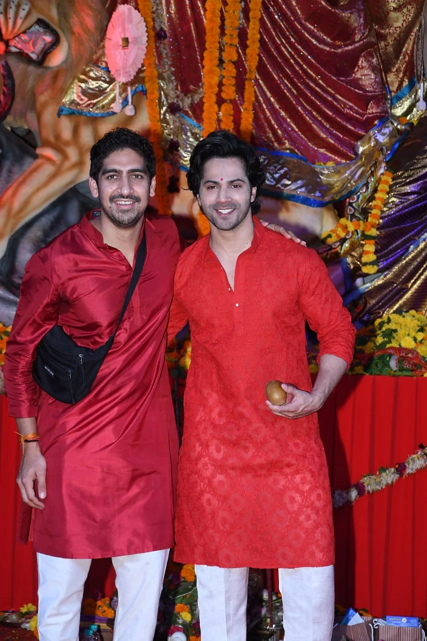 Varun Dhawan with Ayan Mukerji at Durga pandal. Photo by Viral Bhayani