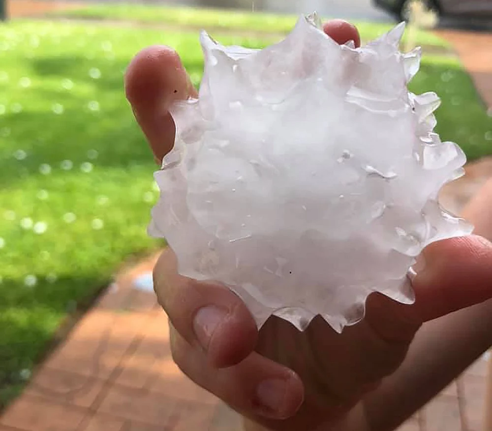 A large hailstone<br />Photo by Handout / RACQUEL COLEMAN / AFP