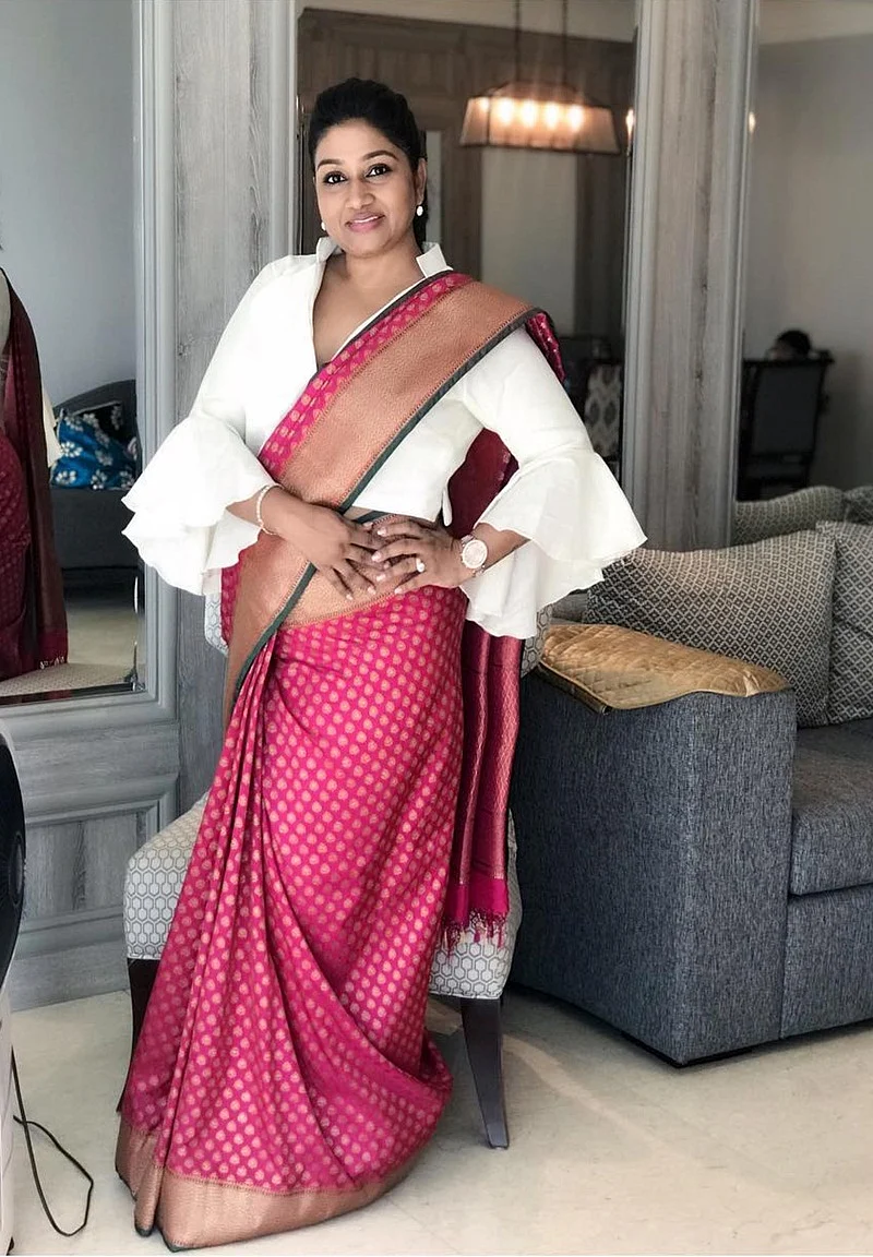 Sari draped on a bell-sleeved shirt