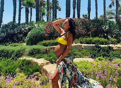 Amy Jackson Glows With The Baby Bump In A Yellow Bralet