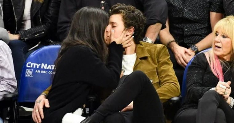 A room isn't enough: Shawn and Camilla's PDA reached heights as they kiss passionately during a...