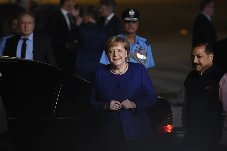 Merkel excused from standing for Indian, German national anthem during ceremonial reception