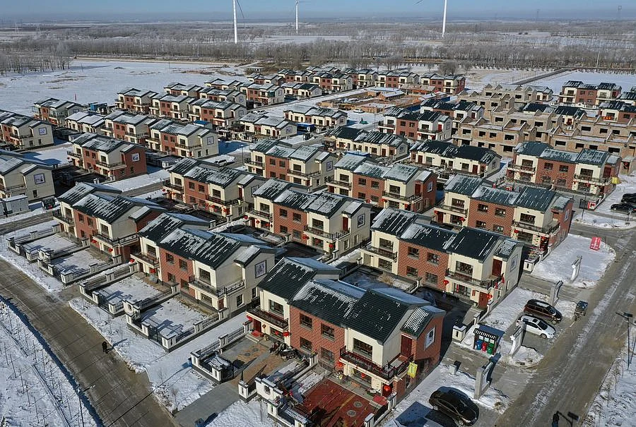 Newly-built houses are pictured at Desheng Village in Zhangbei County of Zhangjiakou City, north China's Hebei Province, in this aerial photo taken on Jan. 8, 2020.