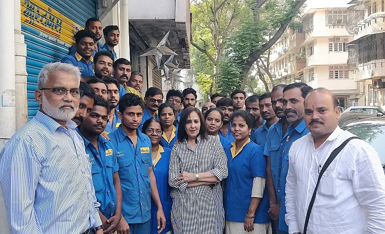 Entrepreneur Rashida Amir (Centre) with her 'family'