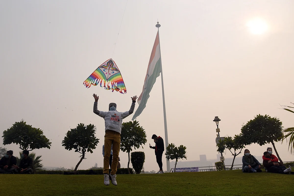 People flying kites on the occasion of Makar Sankranti, in New Delhi on Thursday.