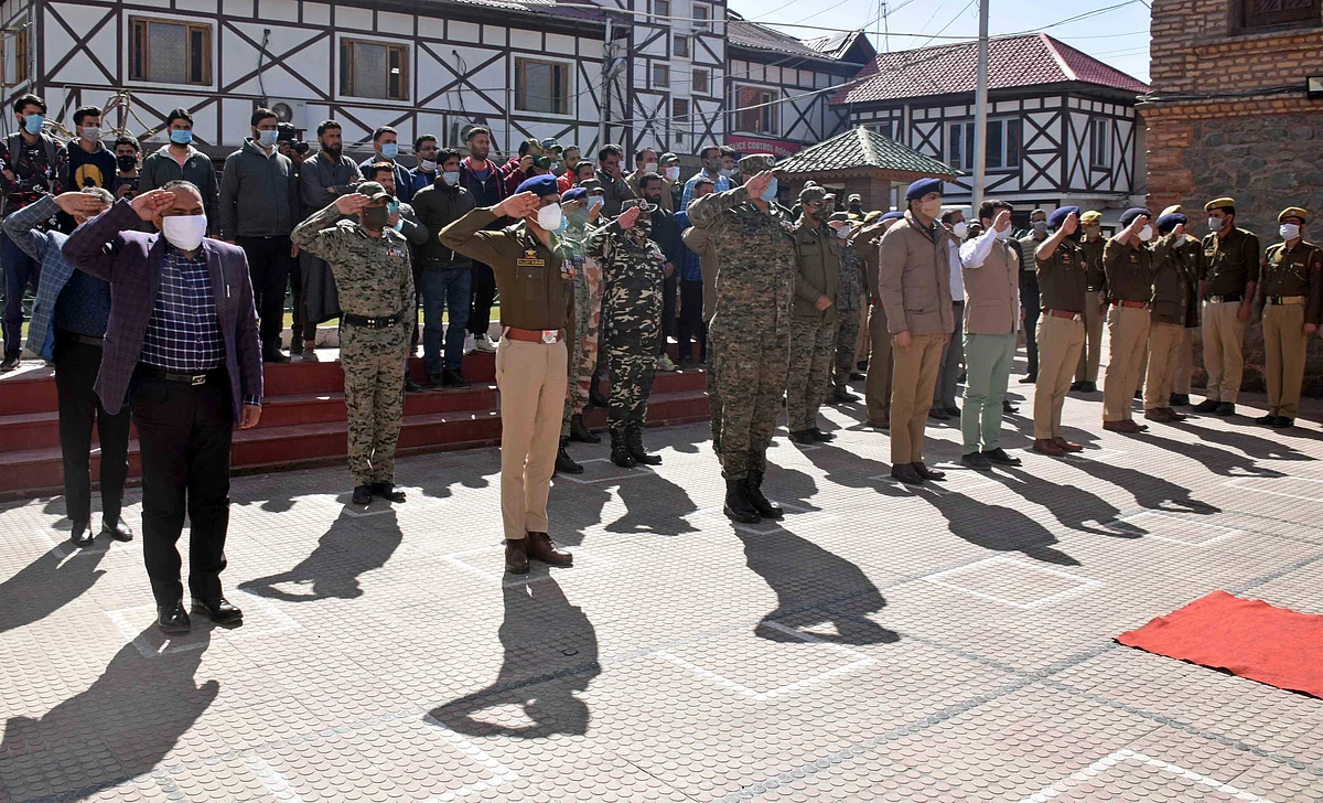 Policemen pay tribute to the last remains of slain policeman Rameez Ahmed Itoo during a wreath-laying ceremony, at District Police Lines in Srinagar.