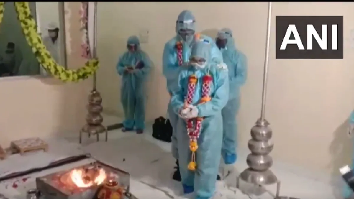 'Why is India so weird': Couple gets married in PPE kits after groom tests positive for COVID-19;...