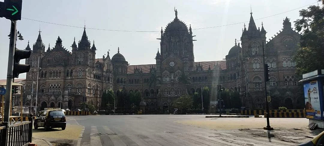 Closed shops and empty streets - With COVID-19 weekend lockdown underway, Mumbai bears a deserted...