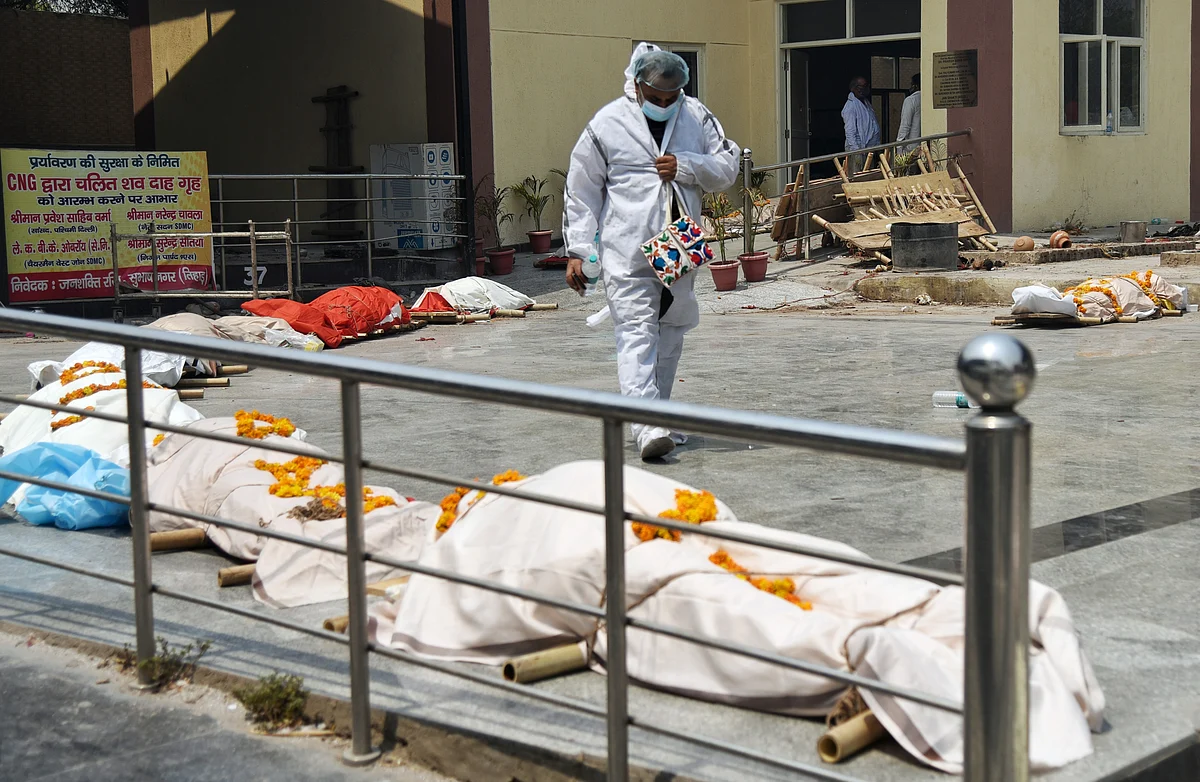 A view of Subhash Nagar Crematorium where a long queue of Bodies of COVID-19 victims wait for cremation in New Delhi on Tuesday.