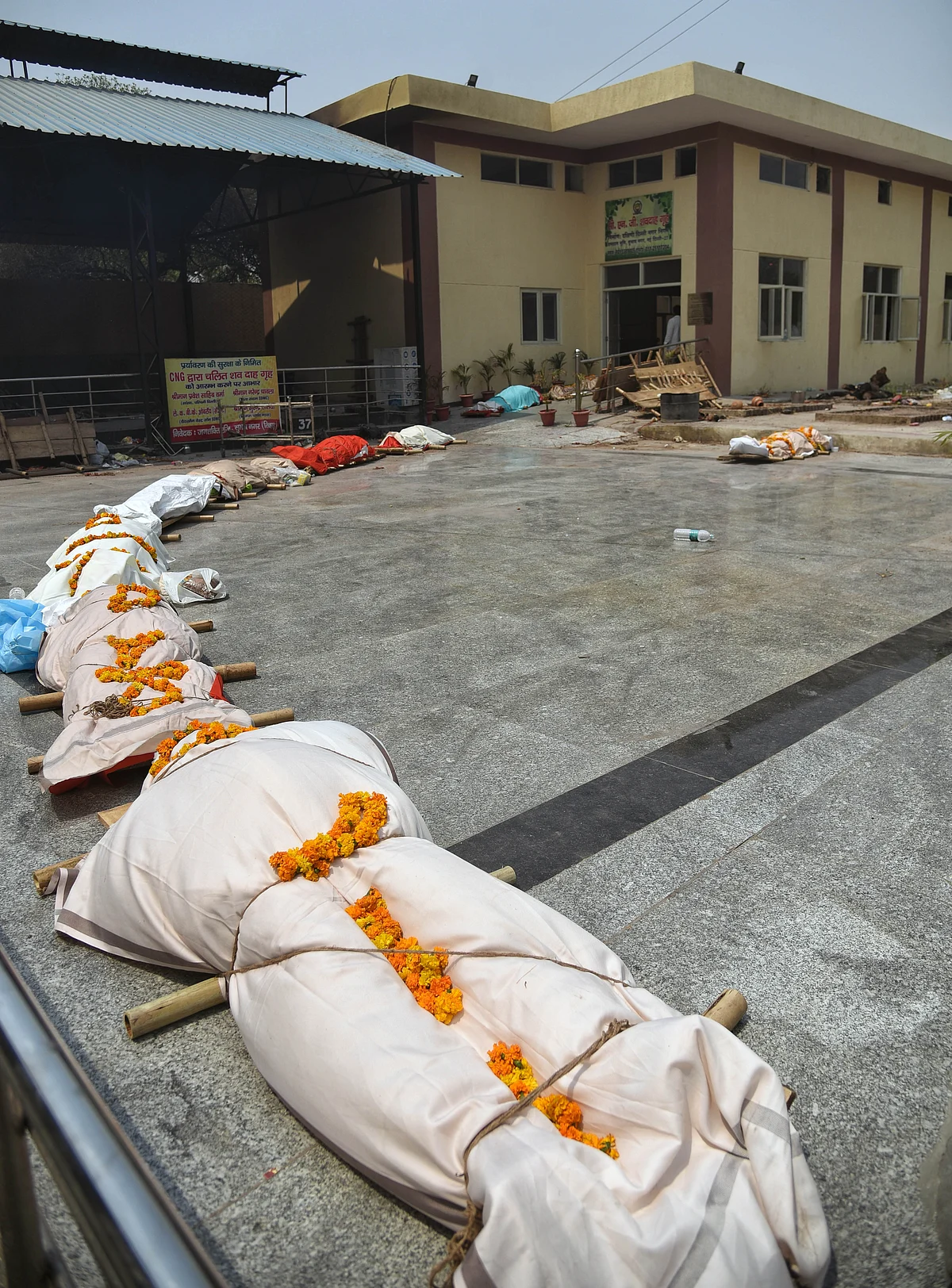 A view of Subhash Nagar Crematorium where a long queue of Bodies of COVID-19 victims wait for cremation in New Delhi on Tuesday.