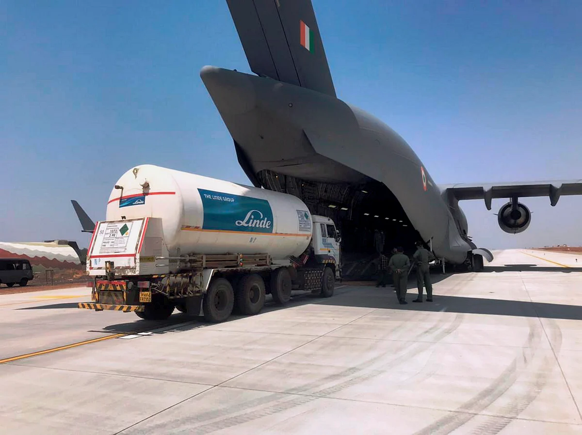 Indore: Indian Air Force aircraft ferries empty oxygen tanker from Indore to Gujarat for second...