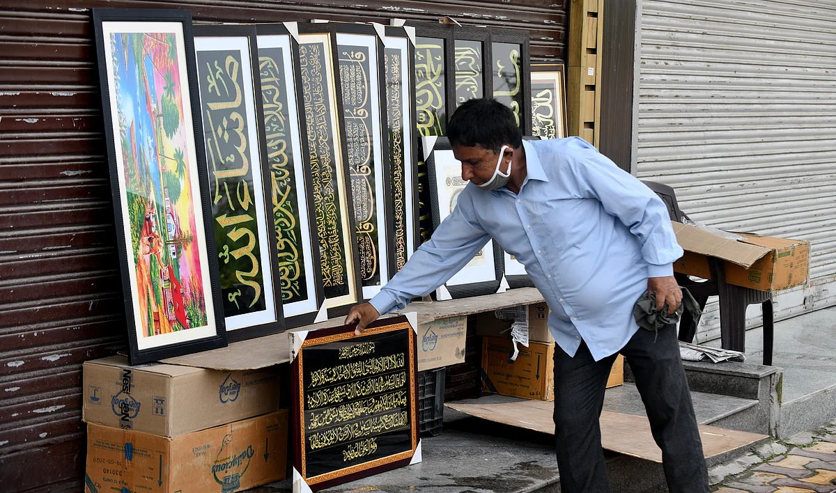 After a month-long lockdown imposed due to a surge in COVID-19 cases markets reopened in Jammu and Kashmir on May 31, 2021. Visuals from Central market at Lal Chowk, Srinagar.