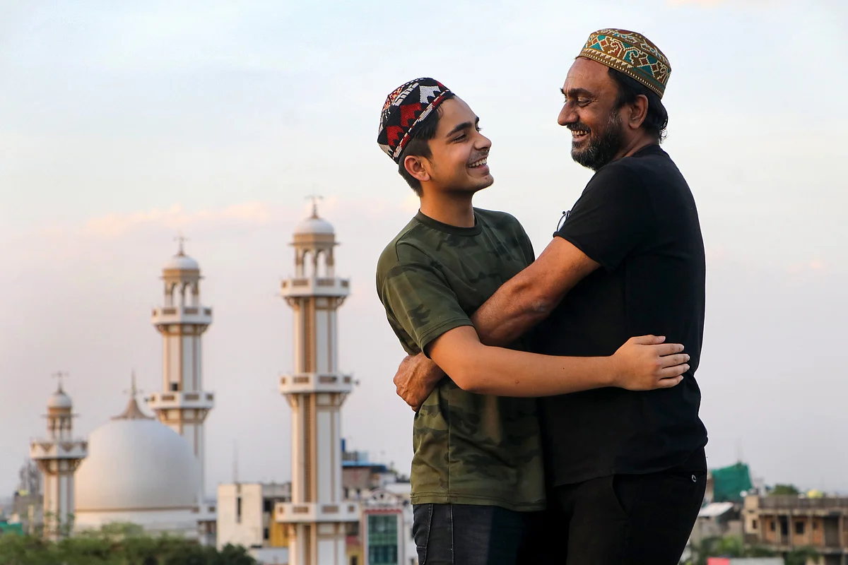 Nagpur: Muslim devotees greet each other on the occassion of Eid ul-Fitr, near Jama Masjid in Nagpur, FrIday, May 14, 2021.
