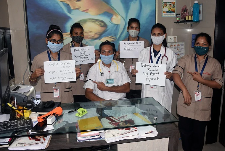 Surat doctors protest wearing black ribbon over the remarks of Baba Ramdev on Allopathy, in Surat