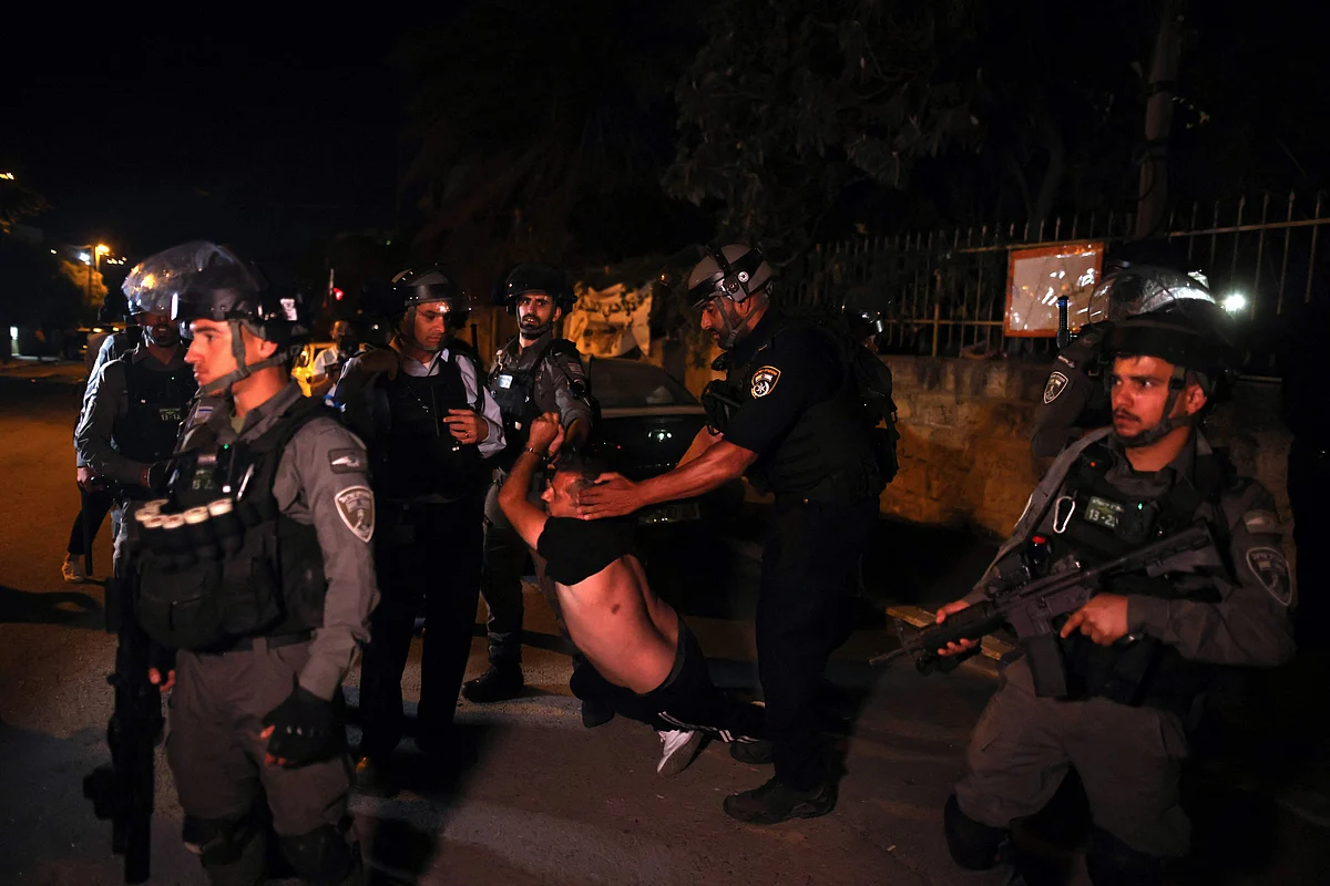A Palestinian demonstrator is arrested by Israeli security forces, as Palestinian families face eviction, part of an ongoing effort by Jewish Israelis to take control of homes in the Sheikh Jarrah neighbourhood of occupied east Jerusalem, on June 21, 2021.