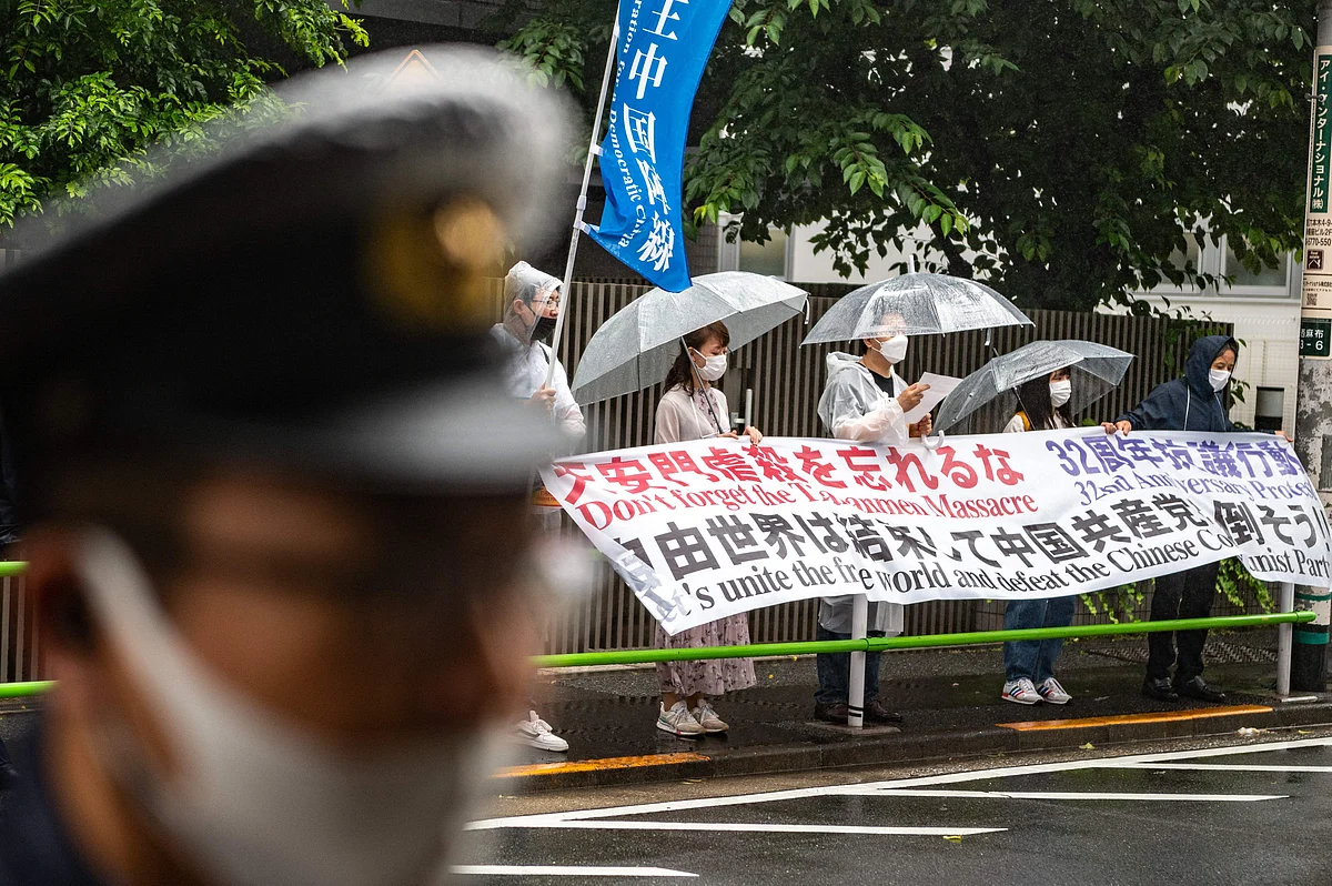Pro-democracy activists chant slogans outside the Chinese embassy in Tokyo on June 4, 2021, as they mark the 32nd anniversary of the deadly 1989 Tiananmen Square crackdown on pro-democracy protests.