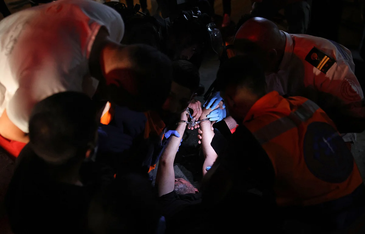 A Palestinian demonstrator is arrested by Israeli security forces, as Palestinian families face eviction, part of an ongoing effort by Jewish Israelis to take control of homes in the Sheikh Jarrah neighbourhood of occupied east Jerusalem, on June 21, 2021.