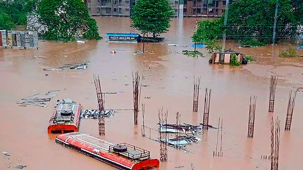 Maharashtra rain fury Chiplun ST depot manager sat on submerged bus