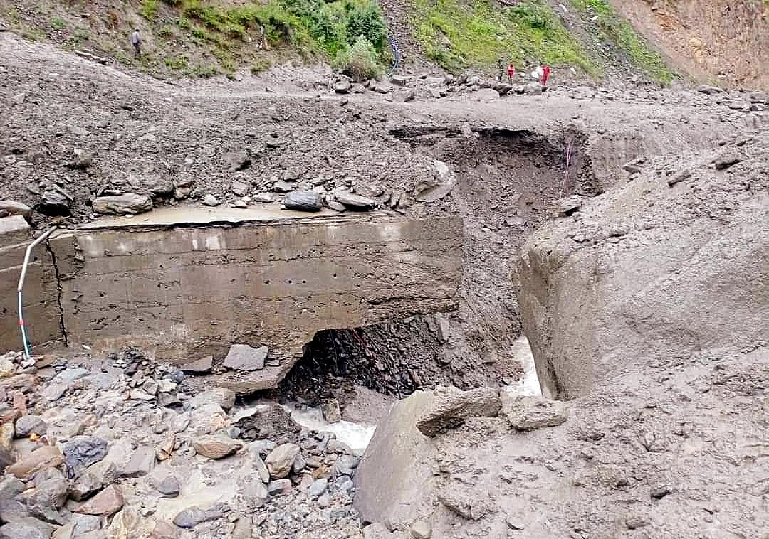 A road got damaged due to the heavy rainfall, in Kishtwar,Jammu and Kashmir on Wednesday.