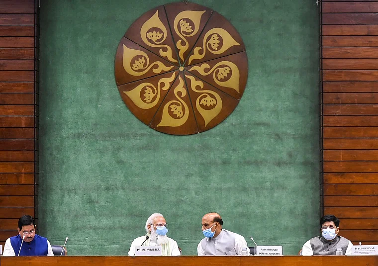 Prime Minister Narendra Modi, Defence Minister Rajnath Singh with Parliamentary Affairs Minister Pralhad Joshi during an all-party meeting