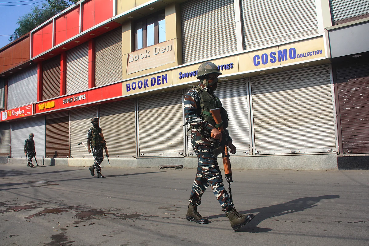 Paramilitary soldiers patrol the street at Lal chowk during a shutdown on the second anniversary of abrogation of Article 370 & 35A in Srinagar, Jammu & Kashmir on August 5, 2021.