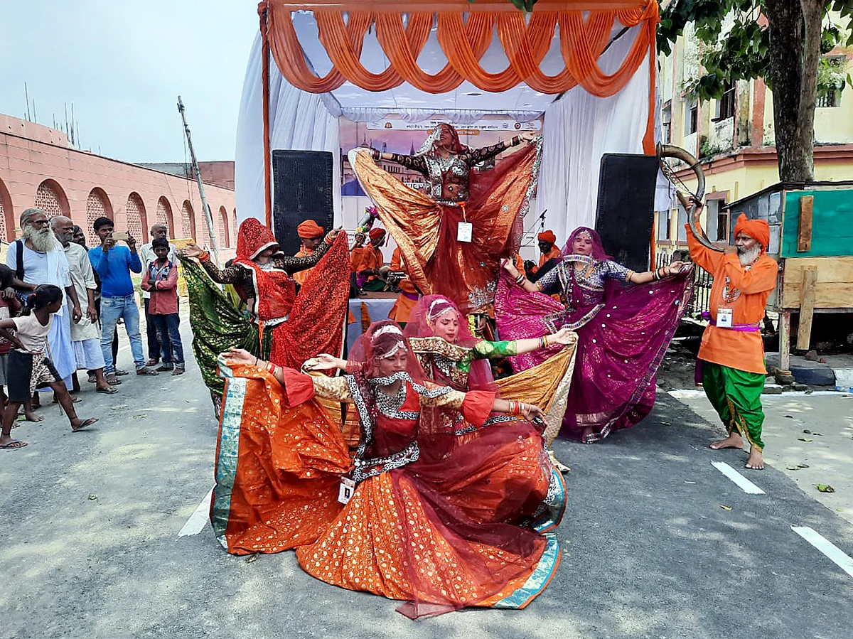 Artists rehearse a cultural dance to welcome President Ram Nath Kovind on his arrival, in Ayodhya on Sunday.