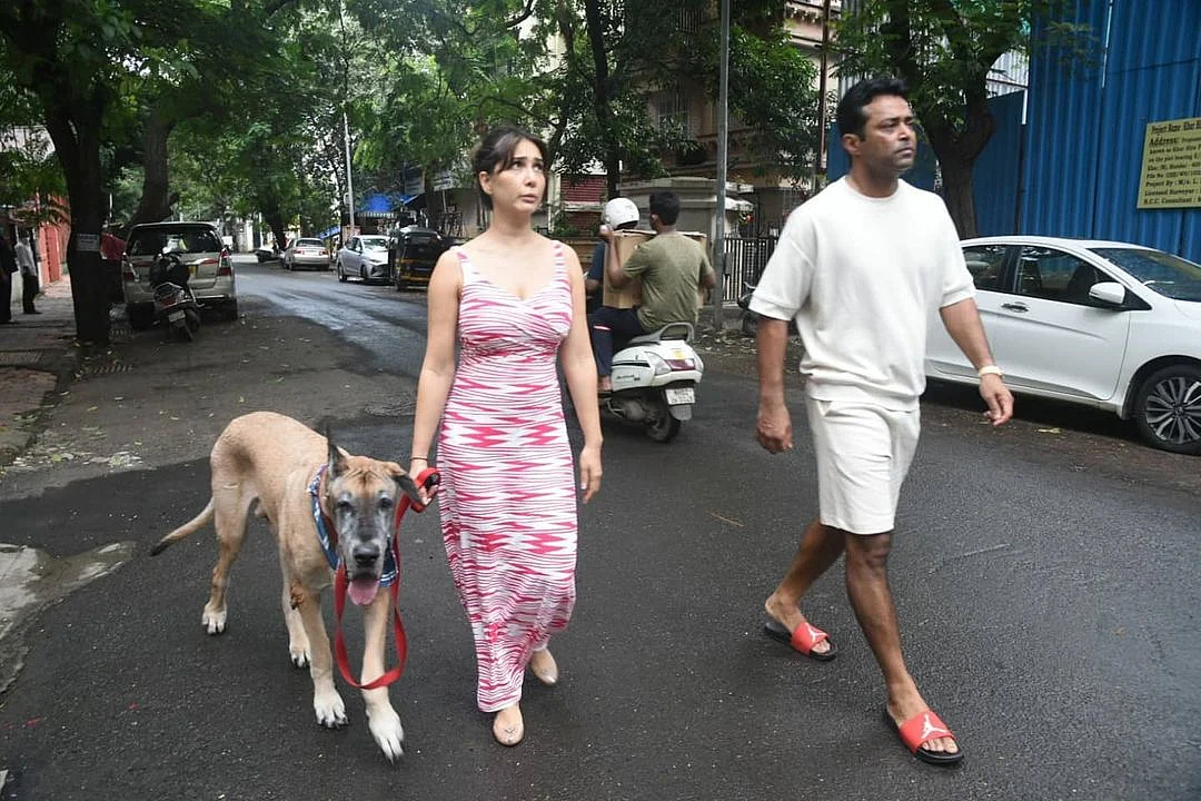 Hot new couple Kim Sharma and Leander Paes called out for strolling hand in hand without wearing...