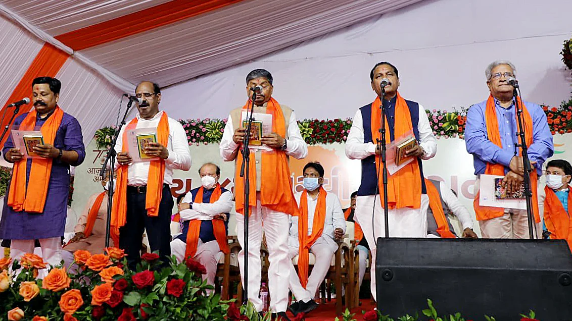 Gujarat minister taking oath during the ceremony, in Gandhinagar on Thursday.