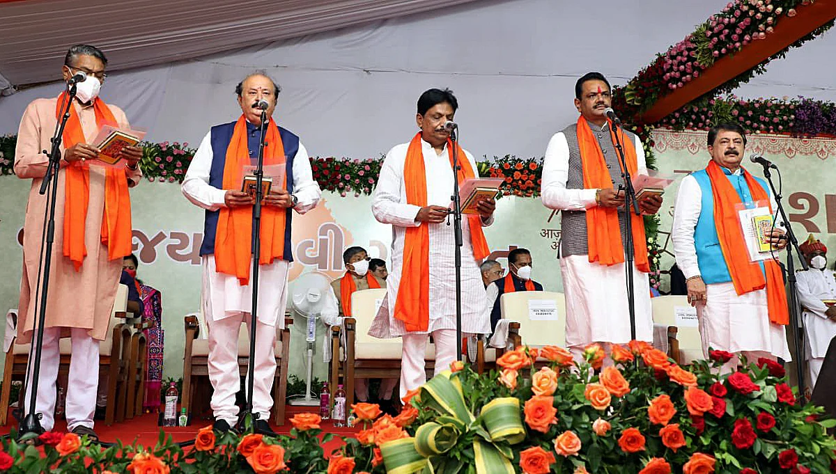 Gujarat minister taking oath during the ceremony, in Gandhinagar on Thursday.
