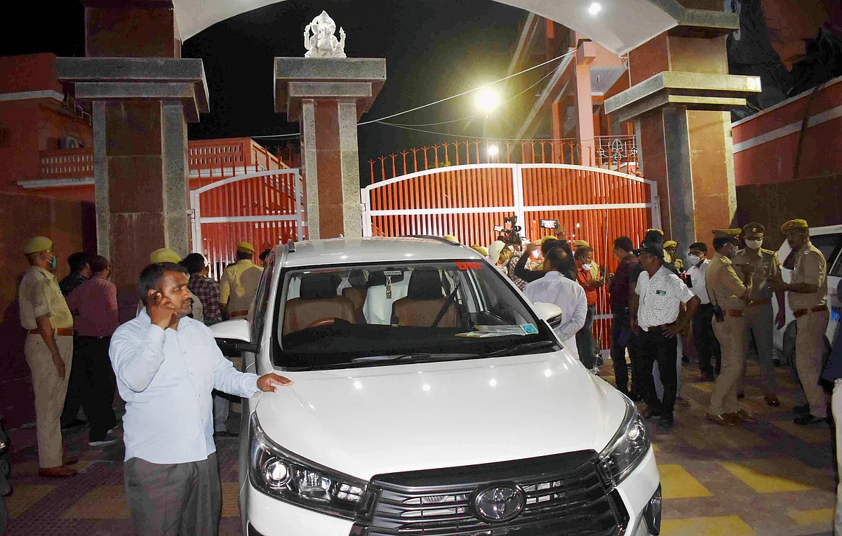 Policemen with administrative?officers investigate at the spot after?Akhara Parishad?President?Mahant?Narendra Giri Maharaj was found dead at?Baghambari Gaddi?Math, in Prayagraj, Monday, Sept. 20, 2021.